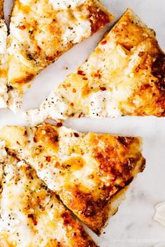 
                    
                        Four Cheese Pizza: Mozzarella, Parmesan, Brie and Ricotta
                    
                