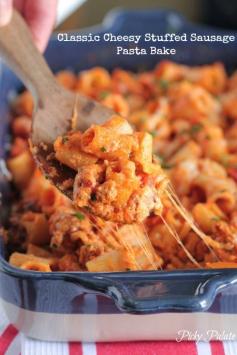 Classic Cheesy Stuffed Sausage Pasta Bake Recipe Main Dishes with rigatoni, italian sausage, pasta sauce, ricotta cheese, shredded mozzarella cheese, grated parmesan cheese, shredded mozzarella cheese