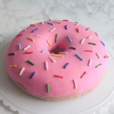 
                    
                        This Sprinkled Donut Cake is Charming and Easy to Recreate #donuts trendhunter.com
                    
                