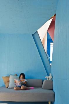 
                    
                        A Multifamily Apartment Turned Into a Multicolored Cross Section of Rooms
                    
                
