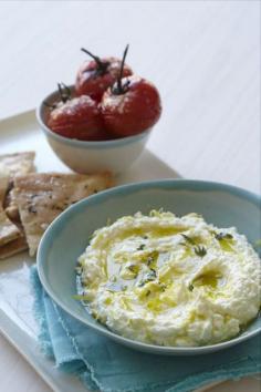 Sweet Paul's Famous Lemon & Feta Dip. Ingredients: 8oz feta cheese, crumbled; 1 tablespoon grated lemon zest; 2 tablespoons lemon juice; 1 clove garlic, chopped; 6 tablespoons olive oil+ extra for serving; fresh thyme. 1.Place feta, lemon zest and juice, garlic and olive oil in a blender and blend until smooth. 2.Spoon into a bowl and drizzle with a little olive oil and sprinkle with thyme. 3.Serve with grilled tomatoes and grilled pita bread drizzled with olive oil, salt and thyme.