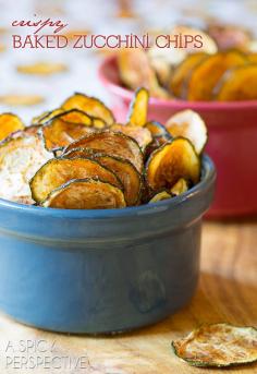 Crispy Baked Zucchini Chips Ingredients 4 large zucchini, evenly sliced 1/8 inch thick 2 tablespoons olive oil Salt ½ teaspoon Hot Smoked Paprika ½ teaspoon Cumin Directions: Slice the zucchini. (Using a mandolin helps keep the slices consistent.) Lay the zucchini slices on paper towels in a single layer. Cover with more paper towels and set a baking sheet on top of the zucchini slices. Press down on the baking sheet, applying slight pressure, to help squeeze out some of the moisture. Preheat the oven to 235 degrees F. (Preheat two ovens if you have them to fit more in at once.) Line several baking sheets with parchment paper. Brush the parchment paper lightly with olive oil. Lay the zucchini slices in a single layer on the parchment paper. Fit as many on each baking sheet as possible. Then lightly brush the top of the zucchini with olive oil. Sprinkle the zucchini slices with salt. You can also sprinkle with a little cumin and smoked paprika for extra flavor. Bake for 1 1/2 - 2 hours until crisp and golden.