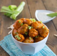 Slow Cooker Buffalo Chicken Meatballs - turn traditional chicken wings into meatballs with just 5 ingredients and it is done in the slow cooker!