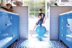 
                    
                        The master bathroom is tiled with cement Fez tiles from L.A.-based Granada Tile. The cabinets are painted with vibrant Dutch lacquer door paint.
                    
                