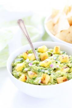 
                    
                        Grilled Pineapple Guacamole Recipe on twopeasandtheirpo... The ultimate guacamole for summertime! Serve it at all of your summer BBQ's!
                    
                