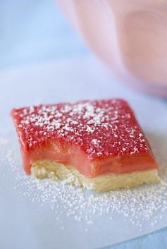 Full Gaps - Rhubarb Bars 400 grams rhubarb (about 10 to 15 stalks) 1/3 cup sugar 6 egg yolks 3/4 cup sugar a pinch of salt 1 teaspoon lemon zest (optional) 50 grams unsalted butter, cut up into chunks 4 ounces butter, room temperature 1 cup (136 grams) all-purpose flour 1/4 cup sugar a pinch of salt about 1/2 of the Rhubarb curd recipe from above Powdered sugar for dusting (optional)