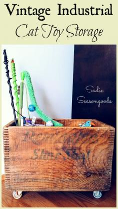 I needed a better way to store pet toys while keeping with our vintage industrial / primitive home decor. So I took an antique wooden crate, added some salvaged casters / wheels, and built an inside "pocket" to keep their toys neat and tidy. I love to organize with an upcycle / repurpose project! #SadieSeasongoods
