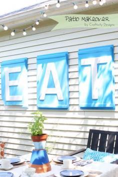 artwork on house in backyard