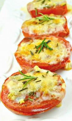 Cheesy Baked Tomatoes are the perfect side dish for almost any meal or any time of the year! They're super quick and easy to make, healthy, can be low in calories, and are really DELICIOUS!
