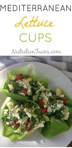 Mediterranean Lettuce Cups - butter lettuce, cucumber, cherry tomatoes, avocado, hummus, crumbled feta cheese, parsley (garnish)