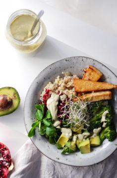 
                    
                        nourish bowl with tofu, brown rice, vegetables + pumpkin seed dressing.
                    
                