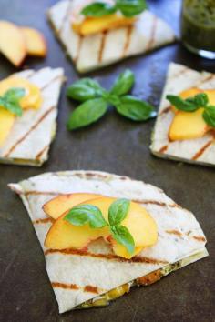 
                    
                        Grilled Peach, Pesto, and Mozzarella Quesadillas Recipe on twopeasandtheirpo... You only need 4 ingredients to make these delicious quesadillas!
                    
                