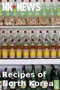 When North Korea and food are mentioned in the same sentence, most people will still think of the famine of the mid-1990s, when untold thousands of North Korean citizens starved and many of the survivors were reduced to eating grass or bark. While food security remains a problem in rural areas of North Korea, in urban areas the "donju", or new middle class, have been spending their good fortune in exclusive restaurants serving not just the traditional dishes of the North such as cold noodles and barbecue duck, but also importing previously unknown foreign specialties like pizza, hamburgers and cappuccino. In fact, North Korea has an almost religious reverence for its culinary heritage. Trainee chefs are regularly dispatched to far-flung country provinces to collect and preserve folk recipes, restaurants are considered as "museums of traditional cuisine", and one of the first websites launched by the North Korean government was www. cooks.org. kp, which showcases local ingredients, recipes and restaurants. While North Korean food is often considered to be less spicy than its Southern equivalent, it also reflects long-standing cultural and commercial links with Russia. Barbecue and hotpot are popular, as in the South, but so is potato salad - a Russian specialty. North Korean dishes are also influenced - just like everything else - by the laws of the regime. While beef is hugely popular in South Korea, in North Korea it is technically illegal, as eating draught animals is banned. Many North Koreans also have an extremely sweet tooth, paying premium prices for imported Chinese candy and South Korean Choco Pies. This book brings together a selection of North Korean recipes. We hope you enjoy both the book and the recipes; jal meokkesseumnida!