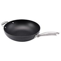 Heating quickly and evenly, this hard-anodized 12" stir-fry pan from Anolon is ideal for Asian cooking, but fabulous for virtually any cuisine. The next-generation nonstick interior means food slides out easily and cleans up with minimal elbow grease, while the exceptionally durable titanium composite exterior and HollowCore handle allow the pan to go safely from stove top to oven for restaurant-quality results. From Anolon.