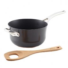 Make a stir turning out creamy, savory risotto created with the unique, efficient Anolon Nouvelle Copper Hard-Anodized Nonstick 4-Quart Risotto Pan and Beechwood Spoon Set. Whether cooking butternut squash risotto or risotto with pancetta and peas, this pan helps prepare this Italian favorite because the beechwood spoon features an opening to speed the interaction of rice and liquid throughout the risotto cooking process. The double full-cap copper and aluminum base distributes heat evenly and efficiently, and the pan is safe to use on all stovetops, including induction. The long-lasting, restaurant-quality DuPont Autograph 2 nonstick is metal utensil safe, easy to clean, and provides superior food release even when making a classic portobello mushroom risotto. The pan's sturdy handle and helper handle are attached with flat rivets for a smooth, seamless interior and quick cleanup even with thick risottos. The risotto pan also is oven safe to 500F and works beautifully alongside other Anolon Nouvelle Copper cookware for a cohesive look in the kitchen.