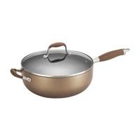 Anolon Advanced Bronze cookware features sophisticated, warm bronze exteriors coupled with deep chocolate interiors, all enhanced by a distinctive flared profile. This large-capacity Anolon Advanced Bronze Nonstick 6-1/2-Quart Covered Chef Pan with Helper Handles combines these features with heavy-duty hard-anodized construction to ensure efficient, even heat distribution for exceptional gourmet cooking performance. Restaurant-tested DuPont Autograph 2 nonstick delivers superior durability, healthier cooking solutions, and easy cleanup that stands up to the rigors of a professional kitchen. The sizeable pan is ideal for searing and braising free-range chicken for an updated version on classic cuisine, and is large enough to toss field mushrooms with hand-cut pasta for a main dish. Revolutionary Anolon SureGrip handles are dual-riveted, rubberized stainless steel for a confident, comfortable grip that is oven safe to 400 F, and the convenient helper handle provides support for moving the pan around the kitchen during cooking. The shatter-resistant glass lid allows cooking procedures to be watched without heat or moisture loss, and because Anolon Advanced Bronze offers a exquisite range of sizes and shapes, this covered chef pan makes a great addition or beginning to the home kitchen. Cover more cooking territory with ease, confidence, and the help of the Anolon Advanced Bronze Nonstick 6-1/2-Quart Covered Chef Pan with Helper Handles, and discover delicious new possibities as a home chef.