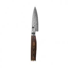 Paring & Peeling Knives - Once you experience the razor-sharp precision and complete cutting control of the Shun Premier 4" Paring Knife, you'll rely on this Japanese handcrafted parer just about every time you cook. Indispensible for peeling, trimming and making decorative cuts in vegetables and fruits, the Shun Premier paring knife quickly chops and dices smaller foods like shallots, chives and garlic. The Shun proprietary VG-MAX core blade with 68 outer layers (34 per side) of stainless-steel holds an incredibly sharp edge longer. The hammered tsuchime finish features a hollow-ground pattern that reduces drag and prevents foods from sticking to the blade. Shun Premier knives are stain- and rust-resistant with a razor-sharp beveled edge for superior cutting performance. The walnut PakkaWood handle is infused with a water-resistant resin and contours to comfortably nestle in the hand. Beautiful Shun paring knives take at least 100 handcrafted steps to complete and resemble hand-forged knives of ancient J - Specifications Material: Proprietary VG-MAX steel, walnut PakkaWood Model: TDM0700 Size: 4"L blade (8 1/2"L w/handle) x 1"W blade Weight: 2.6 oz. Made in Japan Use and Care Your Shun Premier paring knife should be hand washed. Simply wipe clean with a wet cloth and dishwashing detergent. Rinse thoroughly and dry immediately. Dry from the knife handle toward the blade. To prevent slight tarnishing, be sure to remove acidic foods (lemon, mustard, ketchup, etc.) from the blade after use. If blade should show some signs of staining, clean with a nonabrasive metal polish. Occasionally, your Shun Premier paring knife may require professional sharpening to maintain the razor-sharp cutting edge. Shun will sharpen your knife for free, you simply pay for postage. It is best to store Shun Premier knives in a knife block or in-drawer knife tray.