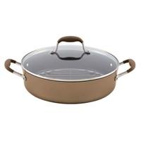 Enjoy superior braising performance and convenience with the Anolon Advanced Bronze Hard-Anodized Nonstick 5-1/2-Quart Covered Braiser with Rack. Slow-cook to perfection with the Anolon Advanced Bronze Hard-Anodized Nonstick 5-1/2-Quart Covered Braiser with Rack. This covered braiser is ideal for dishes like pot roasts and stews that start on the stovetop and finish in the oven. The heavy-duty hard-anodized construction provides efficient, even heat distribution that helps to reduce hot spots that can burn foods, and coupled with a sophisticated palette of a warm bronze exterior and a chocolate interior, this braiser provides an exceptional gourmet cooking experience. DuPonts rugged Autograph 2 nonstick surface inside provides superior food release for easy cleanup, even after roasting a free-range chicken in an herb-butter marinade. The removable rack keeps pork roasts elevated while cooking, away from excess fats and oils. Without the rack, this pan is perfect for braising root vegetables and chicken, and is oven safe to 400F. Revolutionary rubberized Anolon SureGrip stainless steel handles are dual-riveted for strength and provide a confident grasp. A shatter-resistant glass lid allows easy monitoring of food without losing heat or moisture. This braiser complements the other items in all Anolon collections. Features: Oven safe to 400F, the heavy-duty hard-anodized aluminum construction provides fast, even heating and outstanding durability. The removable rack keeps food elevated while cooking, away from excess fats and oils. Long-lasting restaurant-quality DuPont Autograph 2 nonstick is metal utensil safe, easy to clean and provides superior food release. Sturdy Anolon SureGrip stainless steel handles are rubberized for a comfortable, confident grasp.A shatter-resistant glass lid allows cooking to be monitored while sealing in heat and moisture.