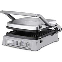 Take charge of breakfast, lunch and dinner with the Cuisinart Griddler Deluxe. Designed for versatility and to give the cook more control, this ingenious appliance can be used as a contact grill, panini press, full griddle, full grill, half grill, half griddle or a top melt. Plus its dual zone temperature controls makes it easy to cook bacon and eggs at the same time, or grill sausages while you griddle peppers and onions to top them simultaneously. It also boasts Cuisinarts new SearBlast technology which sears meats at 500 for up to two minutes to give you that great, perfectly seared flavor you crave. The Griddler Deluxe's large 240 square inch cooking surface also makes it ideal for entertaining. Its easy to read LED indicator lights tell you exactly when your plates are heating up and when they're ready to cook. Its adjustable top cover allows you to use it as a top melt to give you the best open faced sandwiches you've ever tasted. The removable drip tray, and included cleaning tool are top rack dishwasher safe, as are the grill/griddle plates, so clean up is simple too. The Griddler Deluxe also comes with Cuisinart's Limited 3 Year Warranty. Measures 14.61" x 15.67" x 7.56