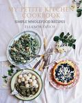 My Petite Kitchen Cookbook is a complete menu of more than 100 simple, wholefood, gluten-free recipes that feed body and soul. Eleanor Ozich has first-hand experience of the health benefits of clean, whole food - the recipes in this book were created as part of her family's 'road to simple eating', adopted as a means of trying (successfully) to cure her four-year-old daughter's severe eczema. Replacing sugar and grains with natural, unprocessed alternatives, Eleanor's recipes show how easy it is to prepare healthy food that is bursting with flavour and goodness. And her stunning photography is a feast for the eyes, capturing the essence of her food - fresh, vibrant, and for sharing. From Caramelised shallot and thyme frittata, Apple and sage pork cassoulet and Slow-cooked zucchini with basil and lemon, to Decadent raspberry and coconut chocolate torte and Lemon and coconut truffles, My Petite Kitchen Cookbook includes breakfasts, lunches, drinks, dinners, desserts and everything in between.