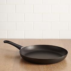 Scanpan is the first producer of nonstick cookware certified PFOA free, so ita ²s safe for your family and the environment. Skillet is compatible with all cooking surfaces (excluding induction) and allows for browning, searing and deglazinga things you cana ²t do with traditional nonstick. It requires little to no fat for cooking, so you can enjoy a healthy meal with minimal cleanup. Patented ceramic titanium nonstick cooking surface is impossible to scrape away, even with metal utensils. Plus, ita ²s dishwasher safe for easy cleanup. Fast and even heat distribution and superior heat retention mean up to 50% energy savings every time you use this skillet. The pressure-cast-aluminum body is guaranteed not to create hot spots and comes with a thick base for optimal performance. Sloped sides make it easy to slide a spatula under food to flip or lift it out. Patented spring-lock handle is comfortable, sturdy, and stays cool during normal stovetop use. Available sizes: 8", 9", 10", 12". Oven safe to 500A°F. Lifetime warranty. Made in Denmark.