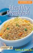 The saying "Have breakfast like a king, lunch like a prince and dinner like a pauper" is completely true. Breakfast is your start of the day and as the name suggests it is necessary to "break" the "fast" that has been going on since dinner the previous night to fuel your body for the day. A good breakfast keeps you energetic and healthy as it provides the necessary as it provides the necessary nutrient boost and prevents bingeing on high calorie foods in latter part of the day. Healthy Breakfast, my newly revised edition of the Total Health Series, comprises of 42 sumptuous breakfast ideas. All the recipes in this book are made with commonly available ingredients. Care has been taken to avoid high fat, processed and refined foods and use low calorie natural variants instead. Recipes have been complied using combination of fruits and vegetables with cereals and pulses and minimal use of fat. One days when you are on the go, try out recipes from the section on Breakfast in a Jiffy and Breakfast using left-overs and on weekends you can make an elaborate dish to please your dear ones from the section on Breakfast with a Little Planning while all office-goers who have breakfast at work can try recipes from Tiffin Breakfast section. Also included is a section on Healthy Drinks and Butter Substitutes. Turn to this book to add more colour, flavour, nourishment and variety to the most important meal of the day and ensure good health for the day and ever…not just for yourself but for your entire family. This ePub book has beautiful images for each recipe and each ingredient is linked to a detailed glossary so that its easy for a beginner to understand every recipe. Happy cooking for morning meals! Welcome to the digital version of Tarla Dalal's Healthy Breakfast! You can now carry your cookbook with you wherever you go. Although this book contains the same delicious and inspiring recipes as the print version, you might find the look-and-feel a bit different, due to