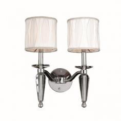This stunning 2-light Crystal Wall Sconce only uses the best quality material and workmanship ensuring a beautiful heirloom quality piece. Featuring a radiant chrome finish, beautiful curved arms with white fabric shades which support 2 candelabra lights and crystal embellishments made of finely cut premium grade 30% full lead crystal, this chandelier will give any room sparkle and glamour. Worldwide Lighting Corporation is a privately owned manufacturer of high quality crystal chandeliers, pendants, surface mounts, sconces and custom decorative lighting products for the residential, hospitality and commercial building markets. Our high quality crystals meet all standards of perfection, possessing lead oxide of 30% that is above industry standards and can be seen in prestigious homes, hotels, restaurants, casinos, and churches across the country. Our mission is to enhance your lighting needs with exceptional quality fixtures at a reasonable price. Finish: Polished Chrome Crystal Color: Clear 30% Premium Full Lead Crystal (2) 60W E12 Incandescent Candelabra Bulb(s) Bulb(s) Not Included Total Watts: 120 Voltage: 110V - 120V Beautiful Polished Chrome finish and dressed with precision cut and polished 30% Full Lead Crystals for maximum brilliance and sparkle From the Gatsby Collection Accommodates up to two 60-watt maximum (40-watt recommended) candelabra base incandescent E-12 bulb (not included) Solid Brass Frame in Chrome Plated Finish, 30% Full Lead Crystal and White Fabric Shade Wall mount with 8" extension from wall UL and CUL Listed to US and Canadian safety standards For Dry Locations only (Dry Locations include kitchens, living rooms, dining rooms, bedrooms, foyers, hallways and most areas in bathrooms) Hardware included Assembly instructions and template enclosed for convenient setup (Professional installation is recommended) 1 Year Limited Manufacturing Defects Warranty Hardwired UL Listed, cUL Listed, CSA Listed Style: Contemporary Part of the Gatsby Collection Warranty Info: 1 Year, Worldwide Lighting Corporation warranties products to be free from defects for a period of one year following shipment. Warranty is and void if merchandise is not installed according to factory instructions, NEC guidelines, and applicable building cOverall Dimensions: 8"(D) x 13"(W) x 16"(H)Diameter Range: Width from 9" to 14"Item Weight: 10 lbs. Please note that this product is designed for use in the United States only (110 volt wiring), and may not work properly outside of the United States*Use of this product will expose you to lead, a chemical known to the State of California to cause birth defects or other reproductive harm. Not intended for food use.