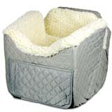 Dimensions: 15L x 17W x 19H inches. Booster seat for small pets. Composed of high-quality foam. Lamb's-wool interior and nylon quilting. Seatbelt slot for added security. Connecting strap for harness connection to seatbelt. Pull-out tray for food, water dishes, toys, and more. Weight capacity: 18 lbs. The patented Snoozer The Lookout II Pet Car Seat - Small is not only the perfect booster seat for small pets up to 18 pounds but it's also perfect for storing all of your pet-care essentials. The handy pull-out tray on the bottom works well to hold water dishes food toys chews and leashes. This innovative seat features a seatbelt slot for security. The comfortable foam form has a lamb's wool interior and a nylon quilt exterior that is snugly secured to the foam body with an elastic band. A connecting strap is included for the seatbelt to easily join the harness connection for added protection. Use this versatile car seat in the house as a bed or in the car as a booster. This seat is recommended for use in the backseat. About SnoozerNorman O'Donnell wanted something better for his dogs but found that pet shops didn't sell such products. So in 1985 he established O'Donnell Industries to manufacture Snoozer™ Pet Products. Today O'Donnell offers customers a profusion of quality pet products. Because today's pets are considered part of the family Snoozer Pet Products are designed to blend easily with almost any home decor. The company's indoor products are crafted from upholstery-grade fabrics available in a multitude of colors and patterns that will keep your animals stylishly warm and comfy. Color: Grey Quilt.