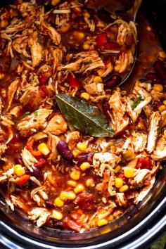 Crock Pot Chicken Enchilada Soup is everything that you love about chicken enchiladas, but in the form of soup! Packed with chunks of chicke...